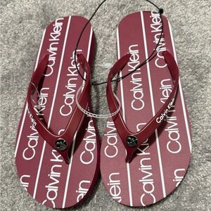 Calvin Klein Women’s Wine Red Thong Sandals with Silver Logo Accent - Brand New